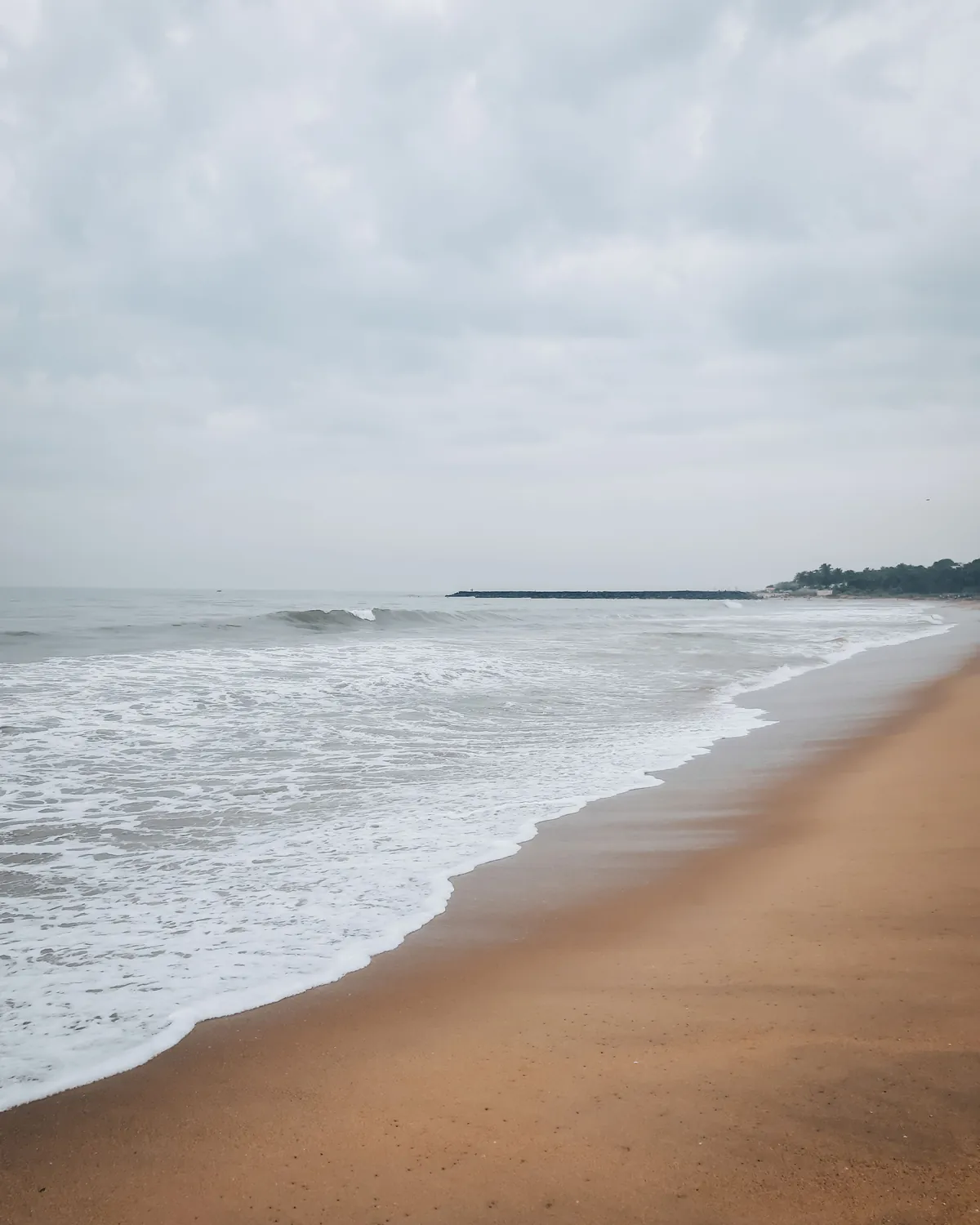 Waves on a sandy beach on the Coromandel coast near Puducherry